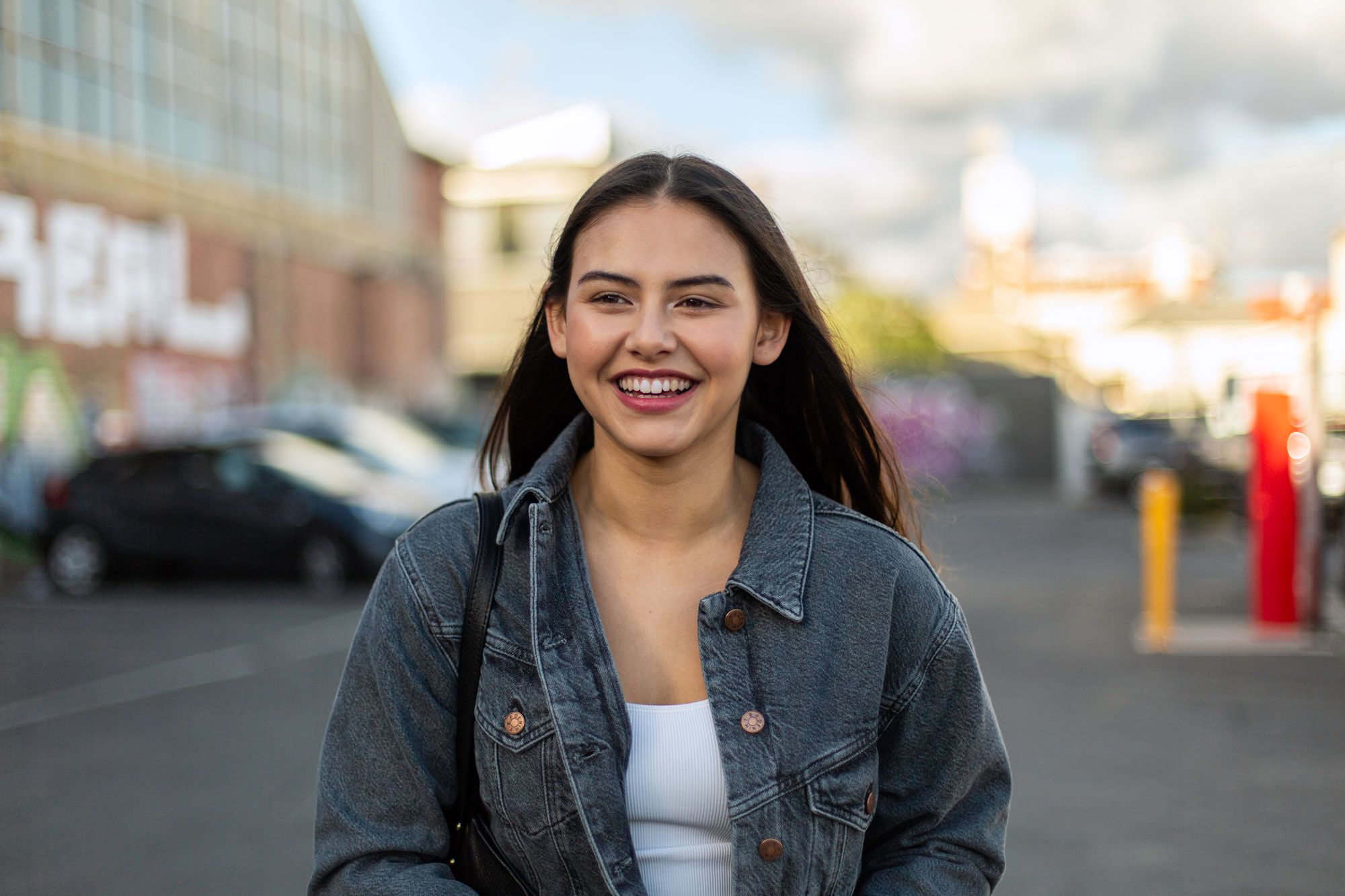 Girl in denim jacket smiling Girl in denim jacket smiling