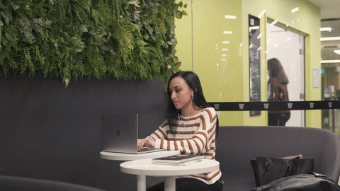 Young woman studies at desk. Song comes on. Crazy dancing. Sits again at desk and resumes studying. 10-15 sec. Young woman studies at desk. Song comes on. Crazy dancing. Sits again at desk and resumes studying. 10-15 sec.