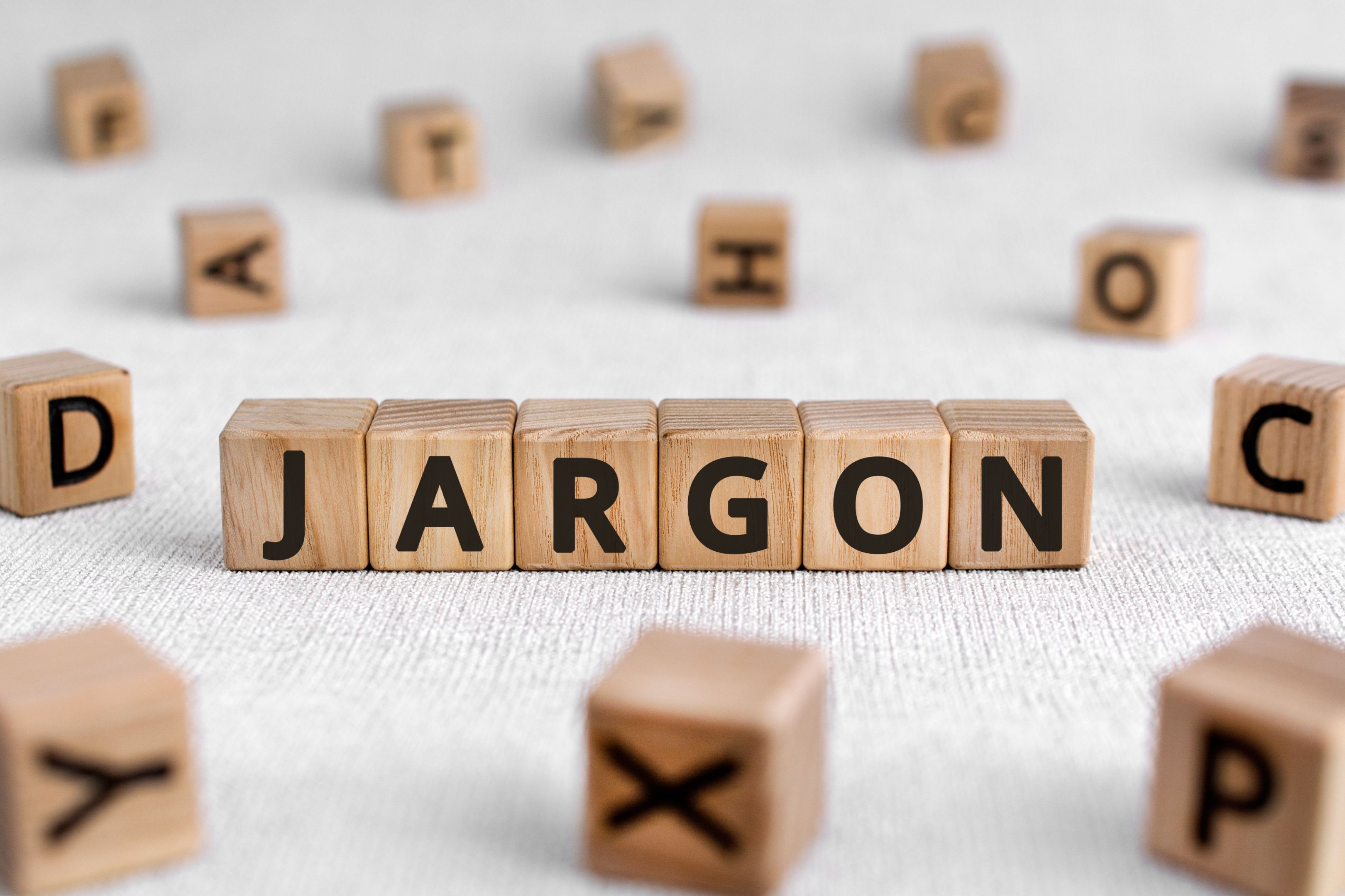 Scrabble tiles spell out the word ‘JARGON’. Scrabble tiles spell out the word ‘JARGON’.