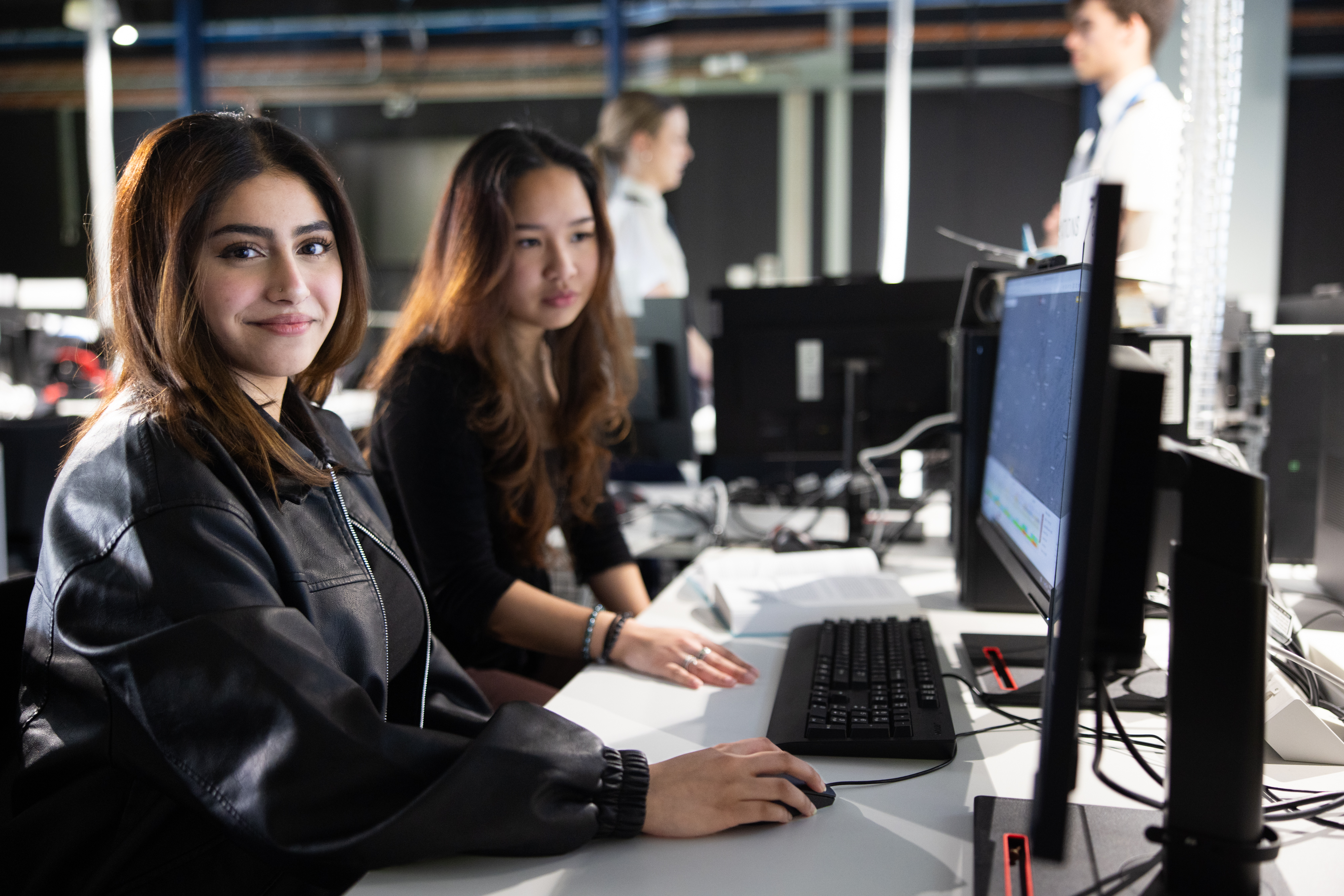 an image of Swinburne students using the Aviation Simulation lab