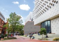 A photo of the ATC and 27 John St buildings shows a greyed out section bordered by red dots to indicate where the new 24/7 Latelab and student hub will be developed