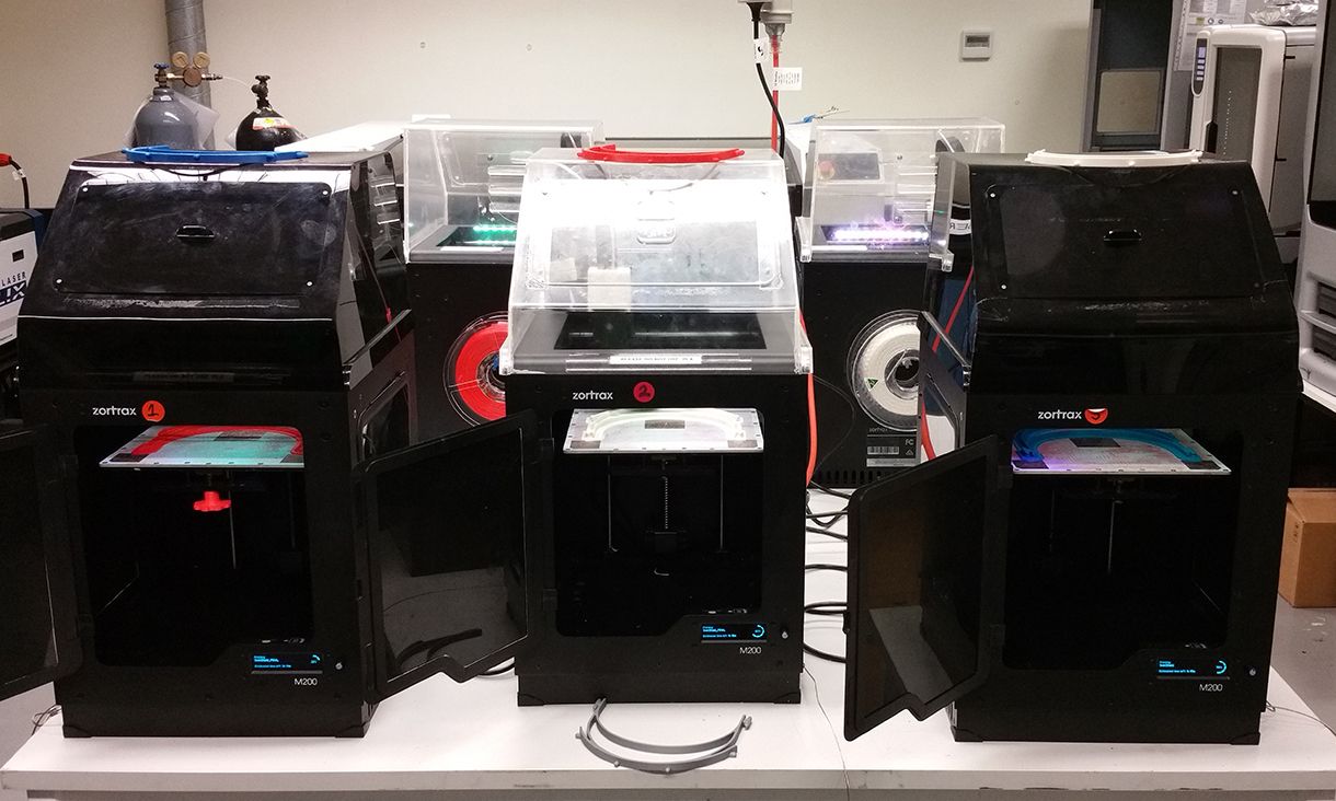 SwinShield printing Three 3D printers printing SwinShield face shields