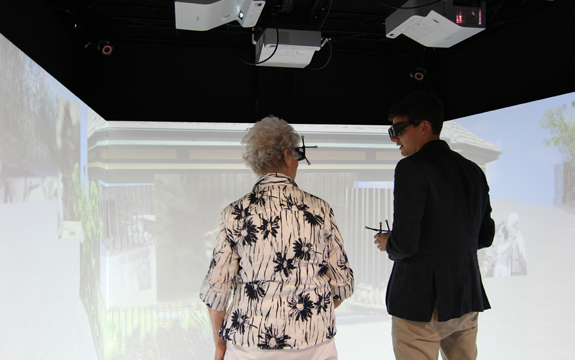 An elderly person wears a VR headset