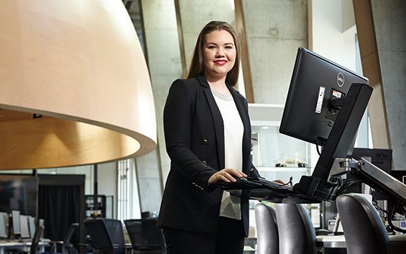 Jacqueline Savage in front of a computer in the ATC