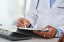 Making a note of his medical duties for the day