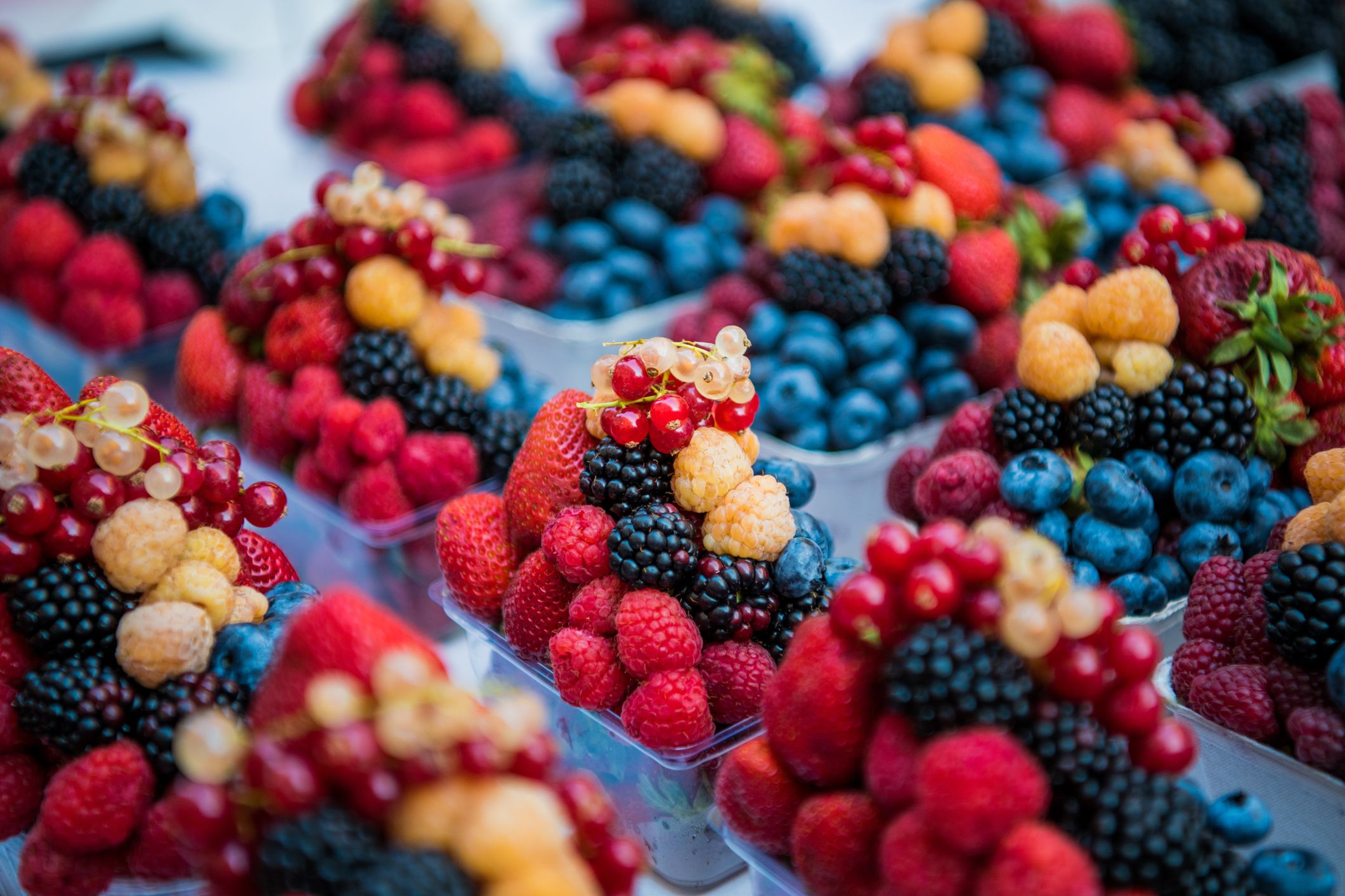 Fruits, berries and vegetables on the counter at the street market. Fruits, berries and vegetables on the counter at the street market