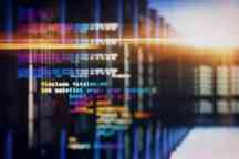 Creative coding lines on blurry server room background.