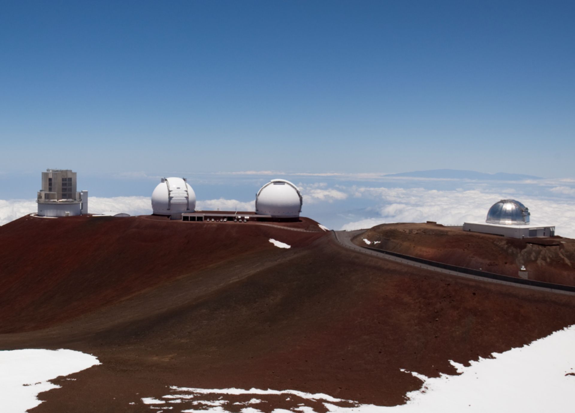 W. M. Keck Observatory on top of snowy Mauna Kea in Hawaii W. M. Keck Observatory on top of snowy Mauna Kea in Hawaii