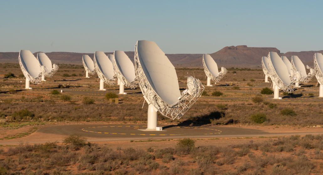 Long-range satellite dishes in a satellite farm Long-range satellite dishes in a satellite farm