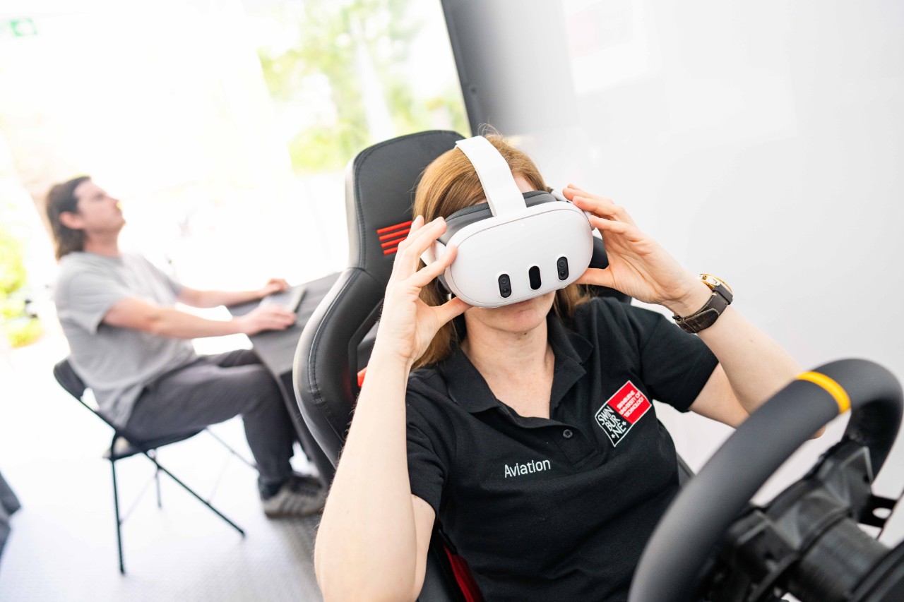 A student using the driving simulator inside the Mobile Innovation Lab.
