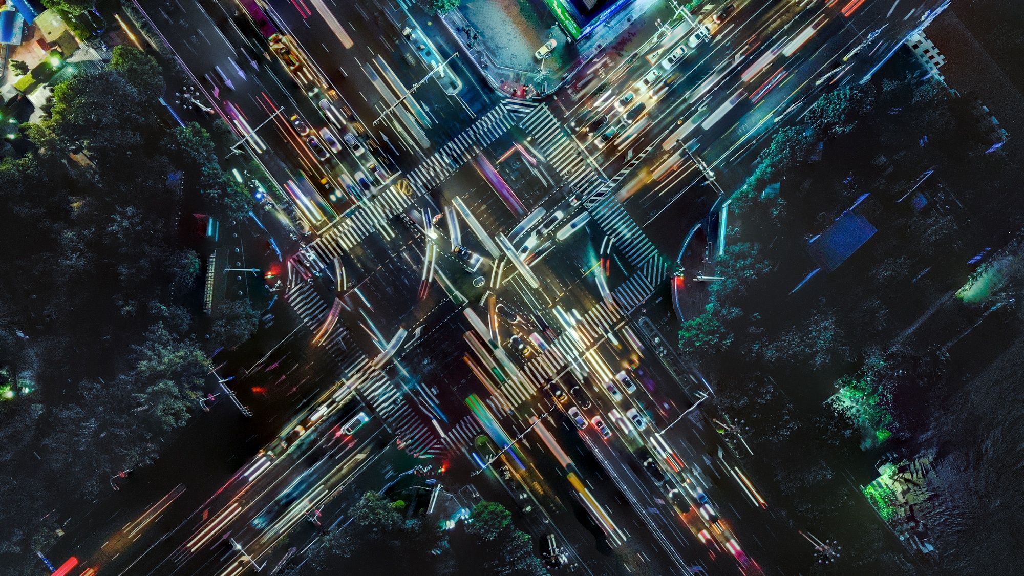 Drone view of a city street crossing Drone view of a city street crossing
