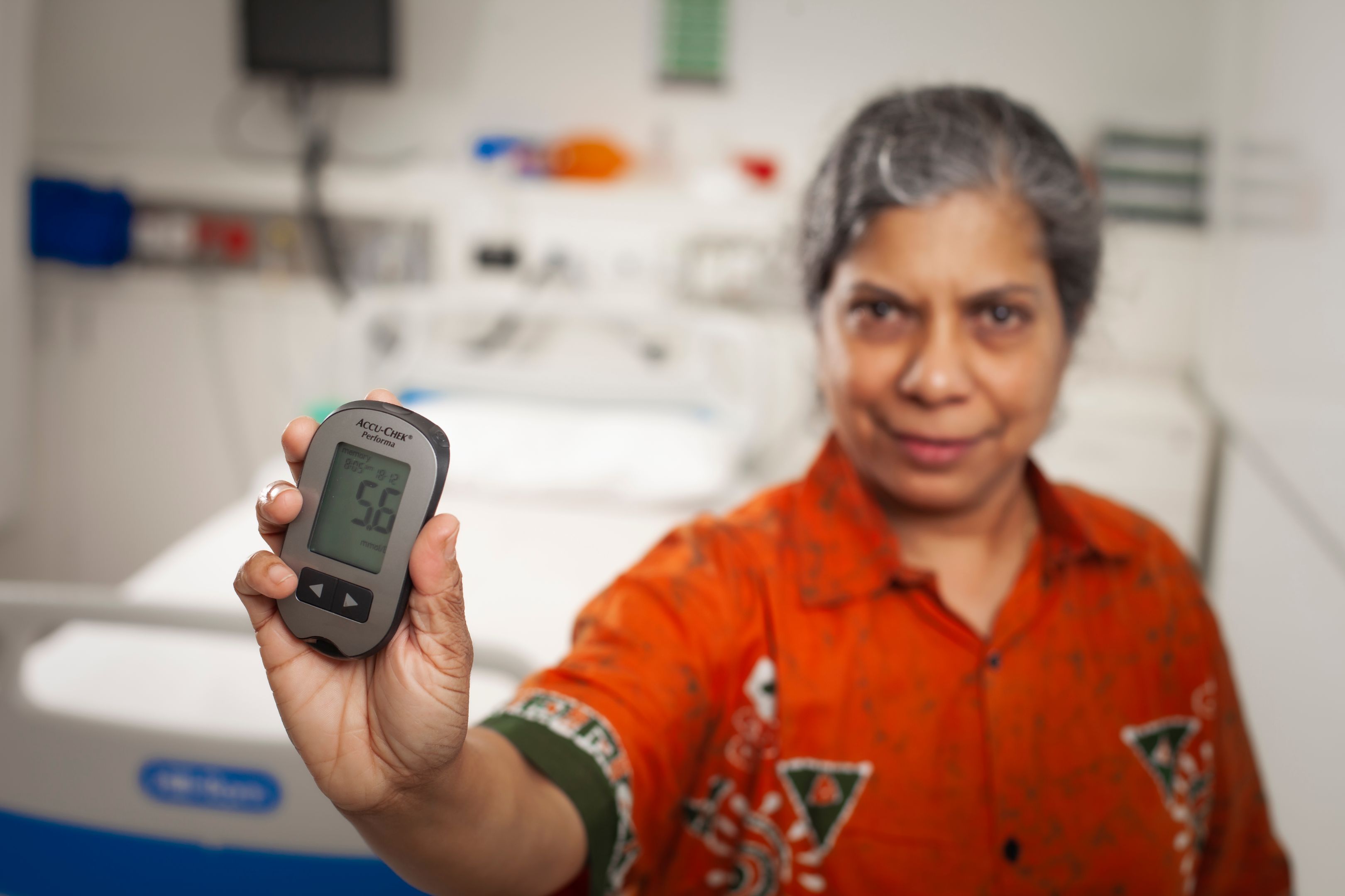 Professor Nilmini Wickramasinghe Professor Nilmini Wickramasinghe holding her DiaMonD (Diabetes Monitoring Device)