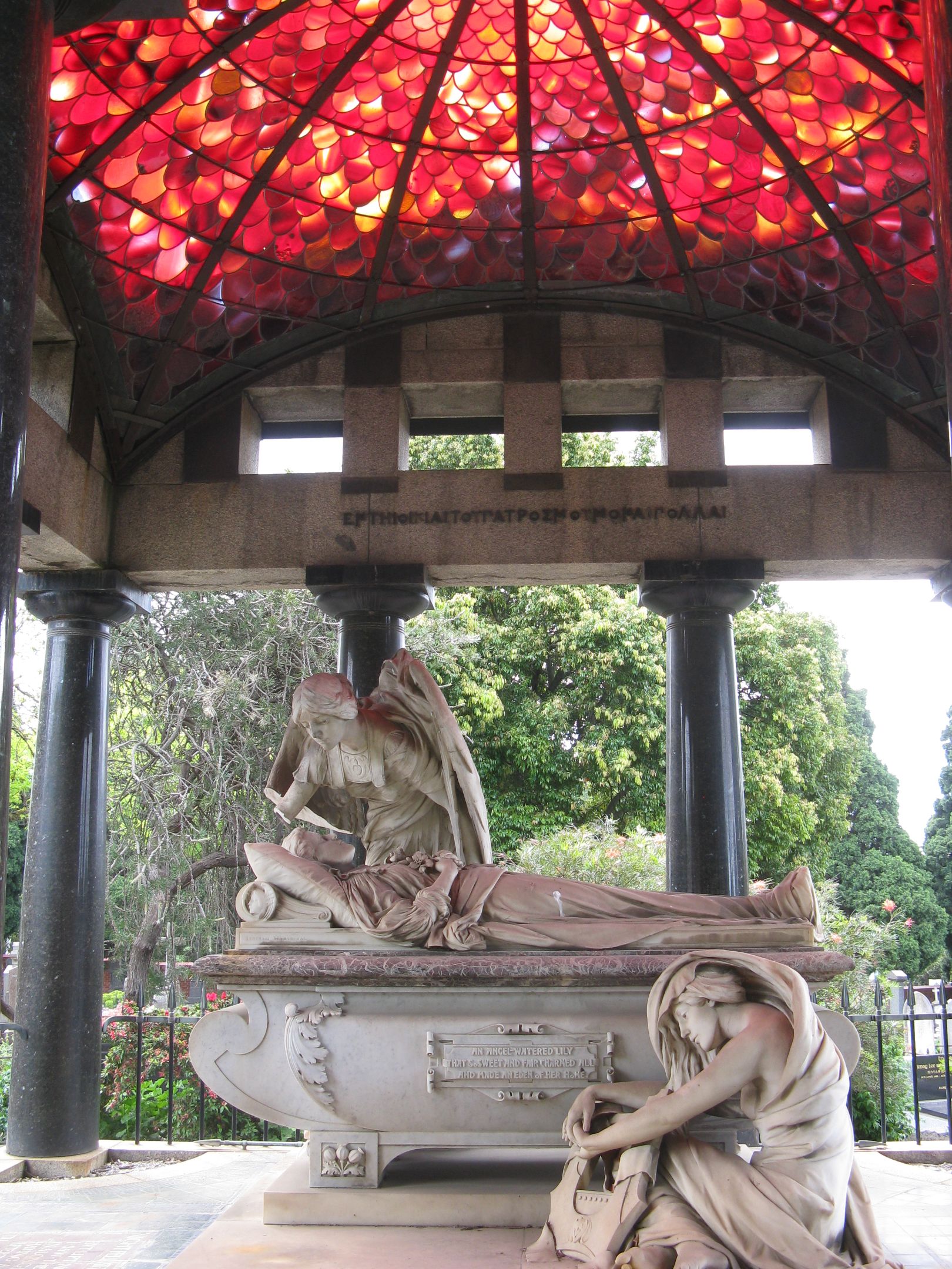 Springthorpe Memorial A statue consisting of a man lying down on a bed, with an angel leaning over him and another woman crouched at the foot of the bed. All are dressed in ancient civilisation style clothes. The status is inside a rotunda in a park with red stained glass on the roof.