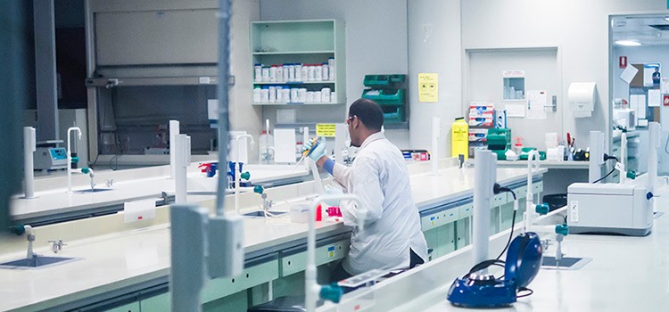 A member of our research team working in our laboratory. A member of our research team working in our laboratory.