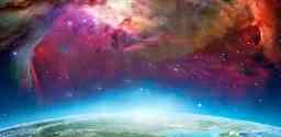 Image from outer space with a section of the earth along the bottom and a colourful light display in the sky