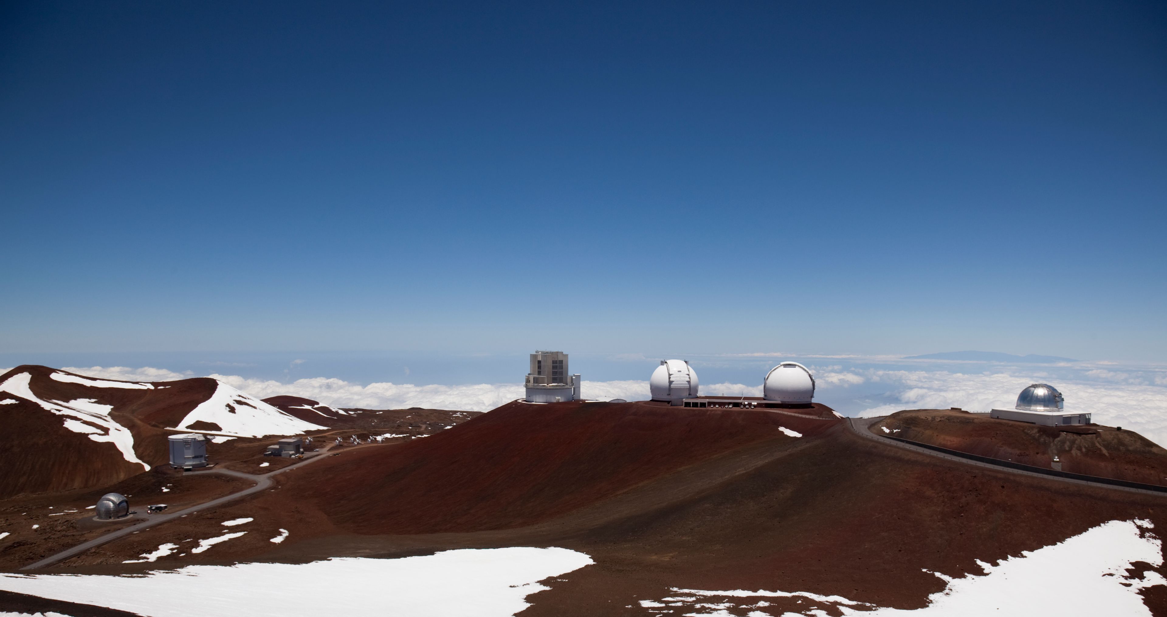 Keck Observatory snow Snow and Telescopes on Mauna Kea in Hawaii