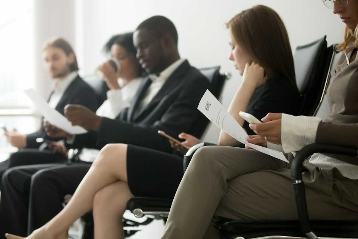 Presenting yourself in a job interview People in a waiting room before their interview