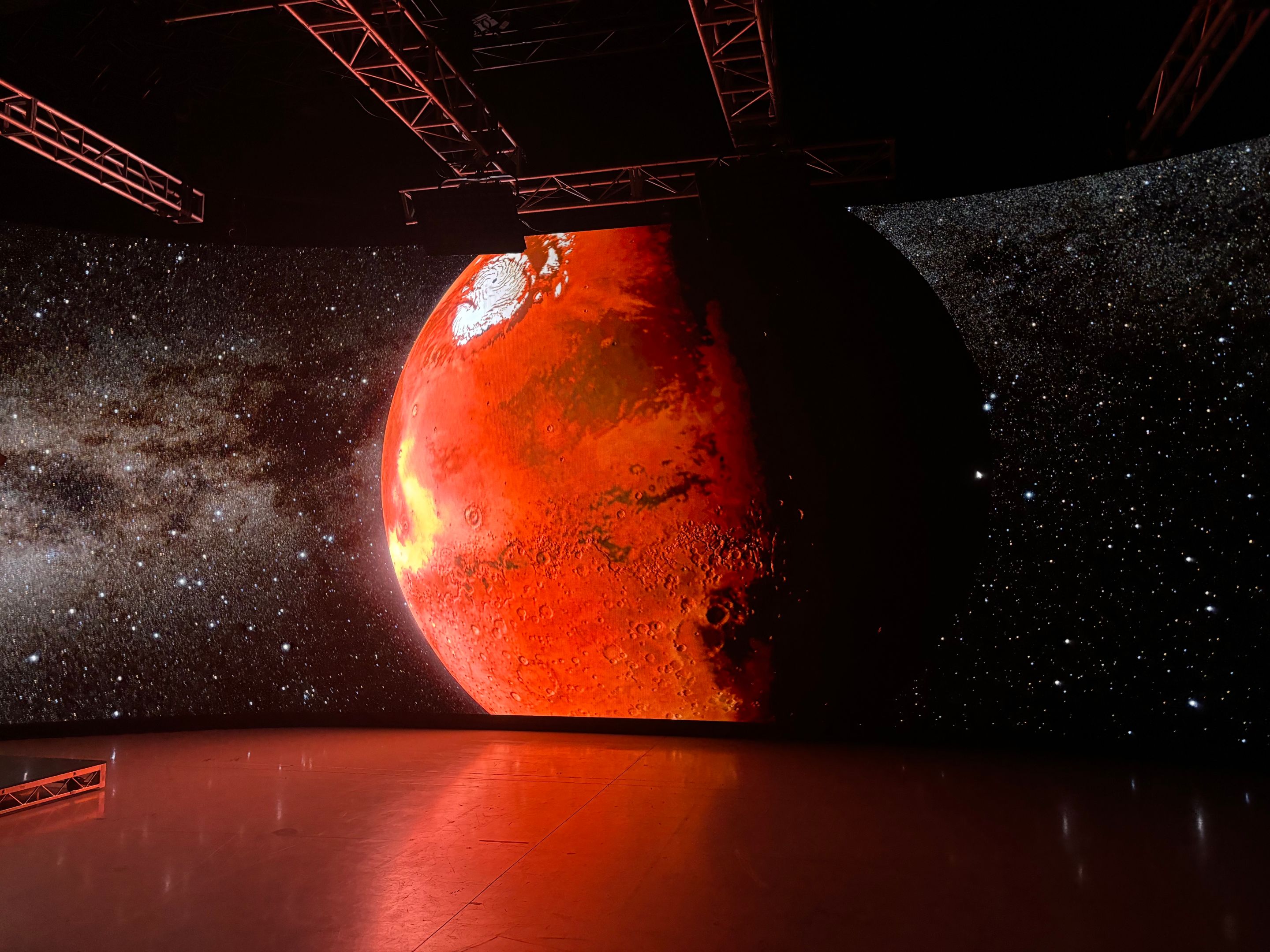 red planet red planet on a screen in a dark room
