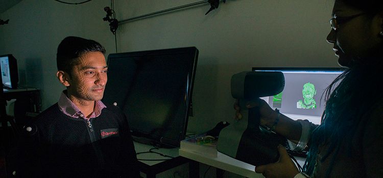 Virtual design lab Researcher creating a virtual image of a person's head