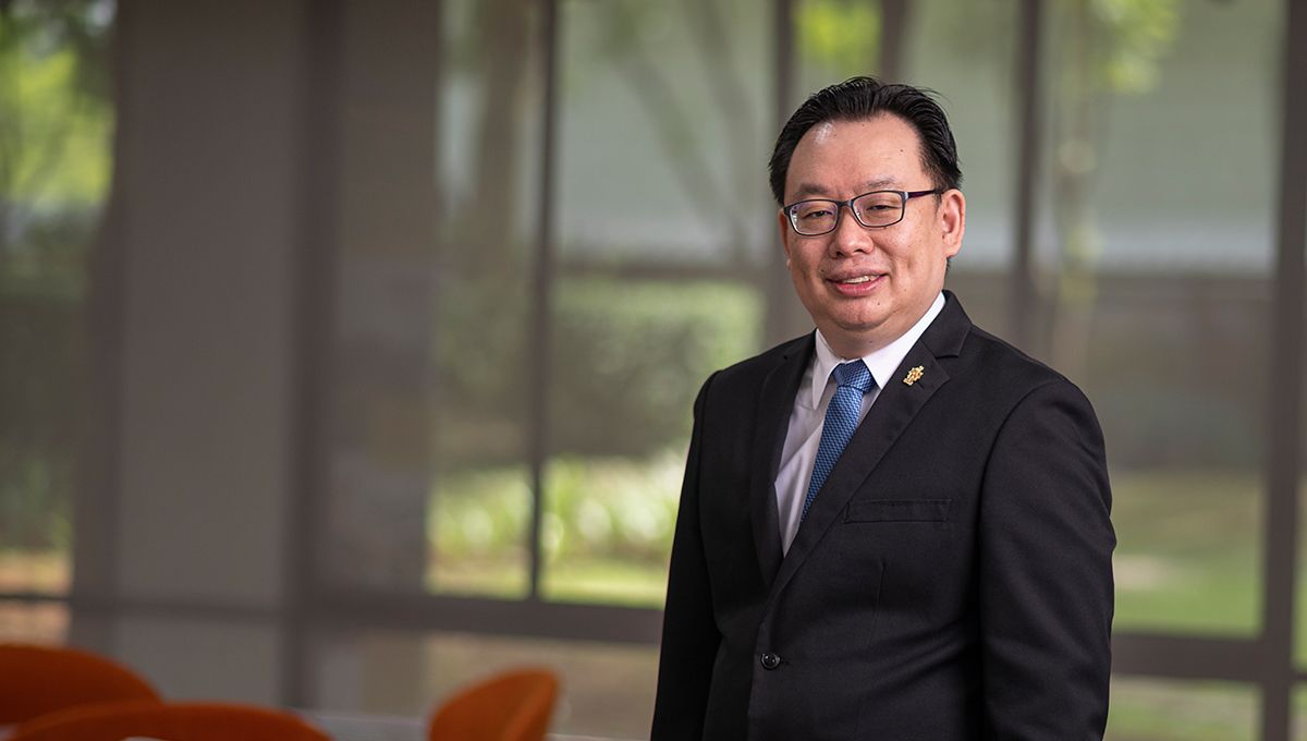 Professor Lau Hieng Ho A professional man wearing a suit and glasses, looks to camera.