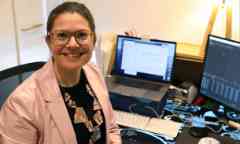 Denby Weller sitting at a computer