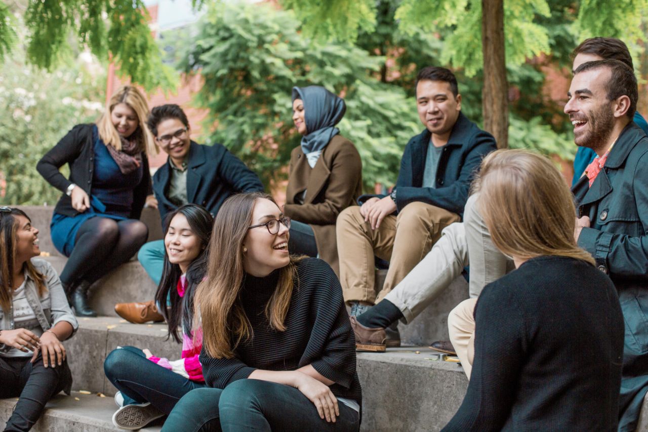 Students ambassadors 2016 Group of students socialising outside on steps laughing