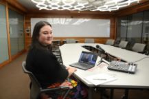 Strategic Foresight alum, Noriko Wynn, at engineering consultancy company, Aurecon. sitting at a desk with a laptop in front of her