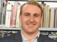 Headshot of Diploma of Library and Information Services student Brad