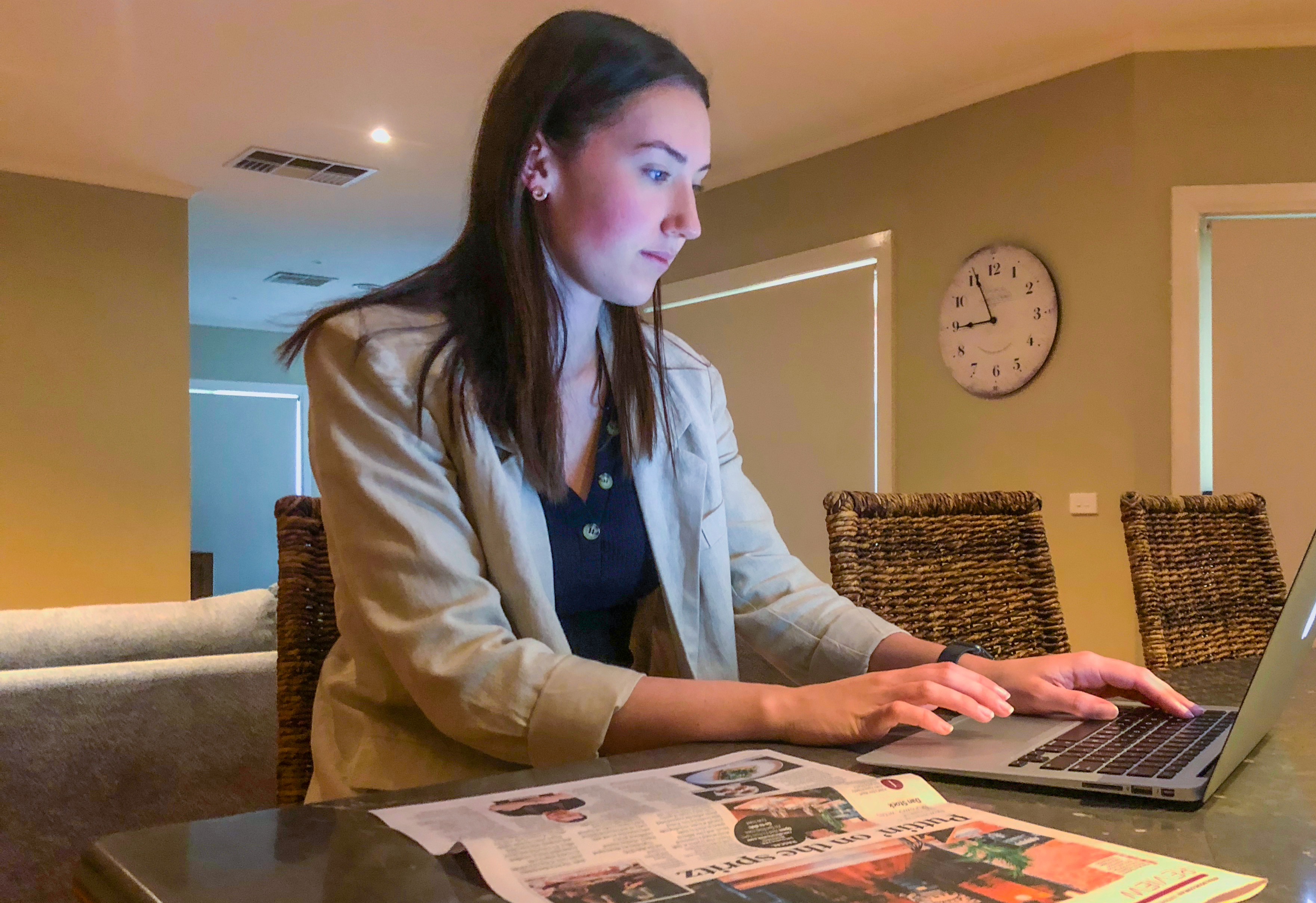 A student using a computer at home