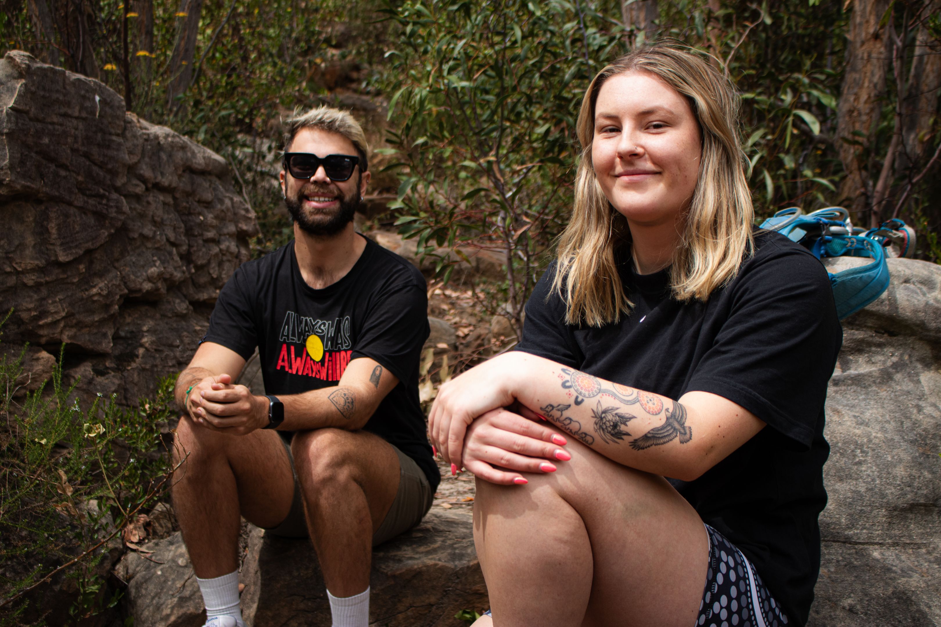 Two participants of the MTC On-Country Development Program relaxing in nature. Two participants of the MTC On-Country Development Program relaxing in nature.