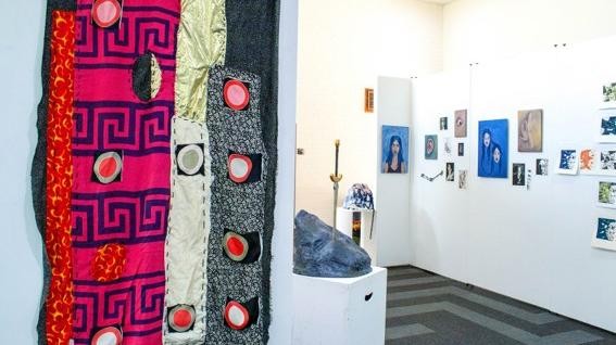 Student art installation displayed within a gallery exhibition space.